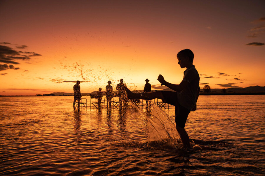 Sunset in Amber season at Tembo Plains Camp