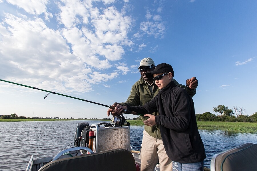 Teenager fishing in Botswana