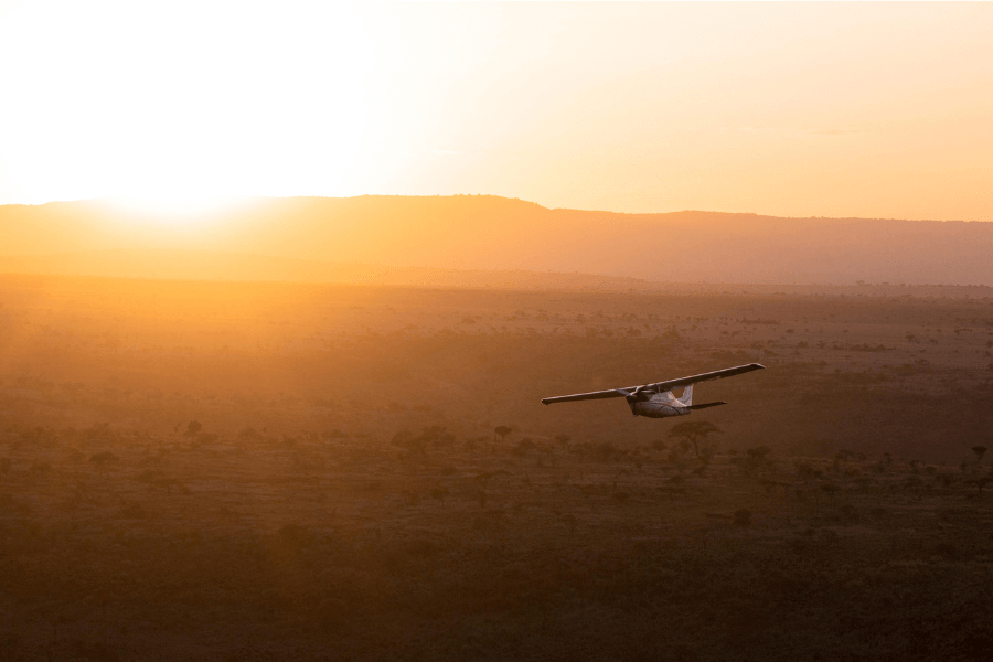 Tourists flying into Arusha safari gateway, ready to explore Tanzania’s classic safari destinations