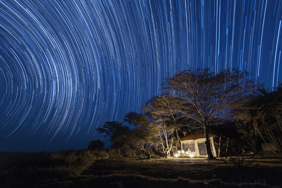 Starlit night sky over a Busanga Safari Camp